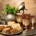 Silver and brass teapots, glasses, and trays that celebrate the ritual and elegance of Moroccan tea culture.